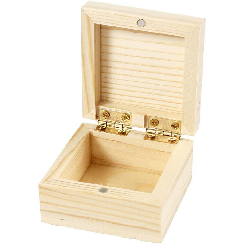 May include: An empty wooden box with a hinged lid. The box is made of natural wood and has a light brown color. The box is open and the lid is propped up.