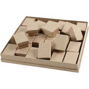 May include: A box filled with small, brown cardboard boxes. The boxes are all the same size and are arranged in a random pattern.