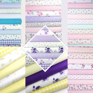 May include: A collection of 24 fabric rolls in various patterns and colors, including floral, gingham, and stripes. The fabrics are in shades of pink, blue, yellow, and purple.