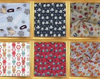 May include: Nine framed fabric swatches with different animal and floral patterns. The patterns include owls, foxes, bunnies, and flowers. The frames are gold.