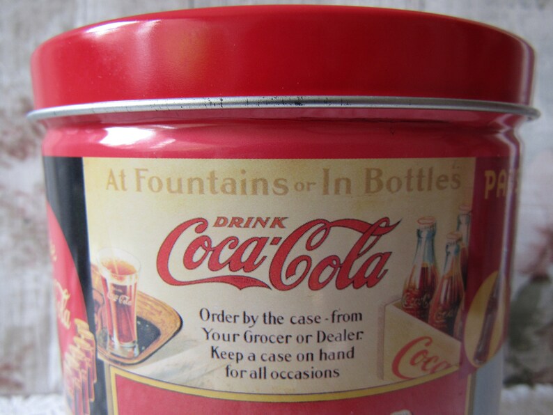 Retro Coca-Cola Ads and Slogans Vintage Coca-Cola Biscuit or Cookie Tin. Vintage COCA-COLA Advertising Tin 1993 Coca Cola Storage Tin