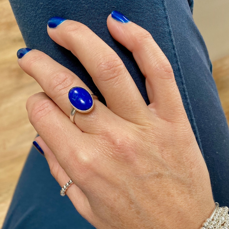 Blue lapis lazuli gemstone ring. September birthstone gift. Oval stone ring.