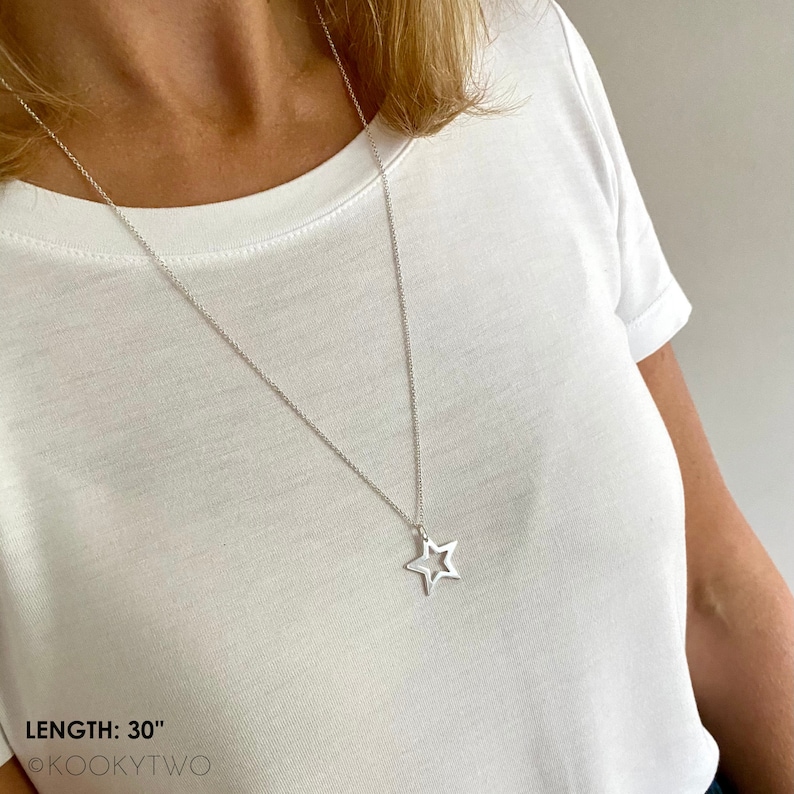 Long necklace with large star charm in 925 sterling silver.
