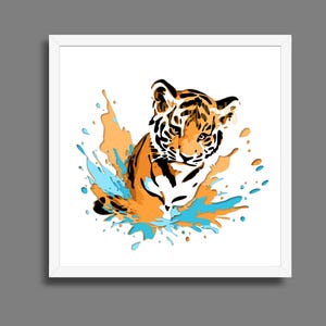 Peut inclure: Une impression d'art encadrée représentant un bébé tigre. Le tigre orange et noir émerge d'une éclaboussure orange et bleue. L'œuvre est sur fond blanc.