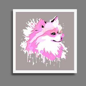 May include: A framed art print showing a dog's head in pink and white against a grey backdrop. The artwork uses a paint-splatter effect, giving a modern feel to the animal portrait. The image is framed in a white border.