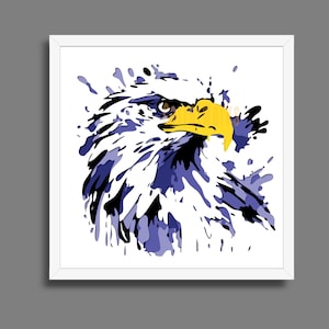 May include: A framed art print featuring a stylized eagle head. The artwork uses a splatter effect with shades of blue, black, and white, with a yellow beak. The eagle is depicted in profile, set against a white background.