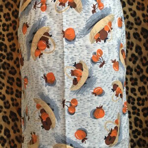 The Rosebud Pencil Skirt in mid-century vintage inspired Tutti Frutti pattern by Doghouse Vintage.