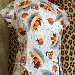 The Rocking Rita Blouse in mid-century vintage inspired Tutti Frutti pattern by Doghouse Vintage.