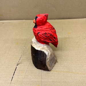 Chainsaw carved cardinal
