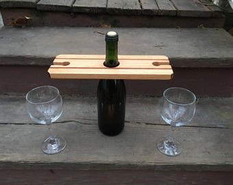 Wine caddy , wine glass holder