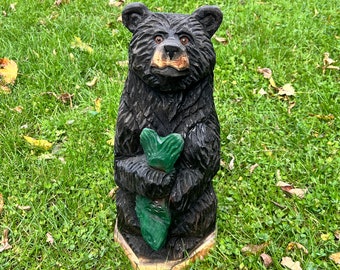 Chainsaw carved bear with fish