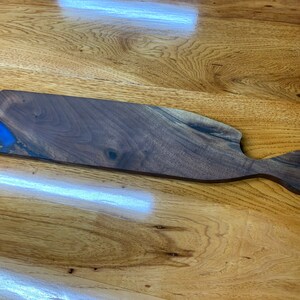 Charcuterie board. Black walnut and blue epoxy