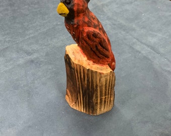 Chainsaw carved cardinal