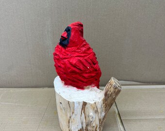 Chainsaw carved cardinal