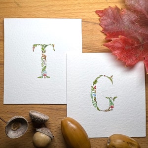 Small watercolour initial, woodland theme. Miniature painting.