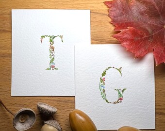 Small watercolour initial, woodland theme. Miniature painting.