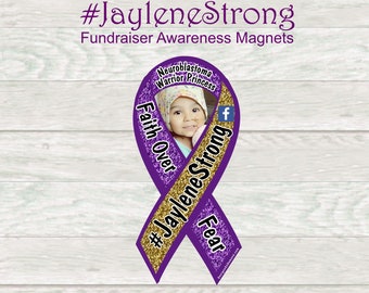 May include: Purple ribbon with gold glitter and the text "Faith Over Fear" and "#JayleneStrong" with a photo of a young girl in the center. The ribbon is a symbol of support for those with neuroblastoma.