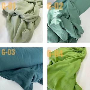 May include: Four fabric swatches in different shades of green and blue. The swatches are labeled G-01, G-02, G-03, and G-04.