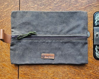 Brown Waxed Canvas pouch to be used as dopp kit or travel gear bag and or as headphone and cables case