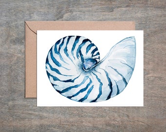 May include: A watercolor painting of a nautilus shell in shades of blue and white. The shell is spiraled and has a smooth, glossy finish.