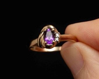 Delicate Oval Amethyst Ring with Side Diamonds