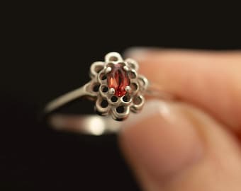Vintage Garnet Sterling Ring · Oval Red Gemstone · Floral Halo Setting