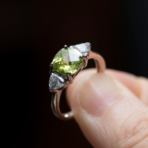 Cushion Cut Peridot Type Stone Silver Ring with 2 Trillion Cut Cubic Zirconia Side Stones