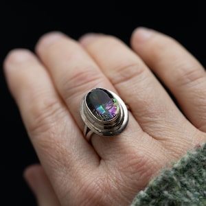 Oval Silver Mystic Topaz Ring in a Bezel Setting