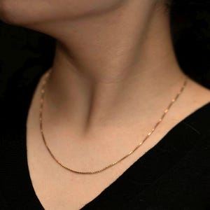 Vintage halsband i 10 karat guld med kedja · 21 tums fin hängkedja