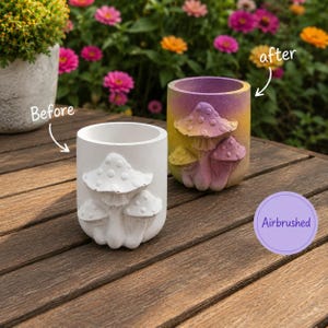 May include: Two cylindrical planters featuring raised mushroom designs. One planter is plain white, while the other is airbrushed with a gradient of purple, yellow, and pink. The text Before and After appears with arrows, and the word Airbrushed is in a circle.
