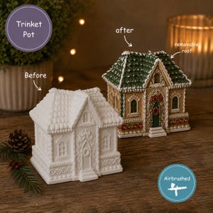 May include: Two house-shaped trinket pots, one plain white and one painted with a green roof and brown walls. The painted house features a removable roof, a green door with a wreath, and decorative details. Text includes Trinket Pot, Before, after, removable roof, and Airbrushed.