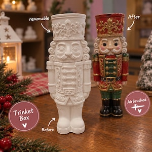 May include: A nutcracker trinket box shown in two states: a plain white unpainted version labelled removable and before, and a fully painted version in red, green, gold, and black labelled after and airbrushed, featuring ornate detailing.