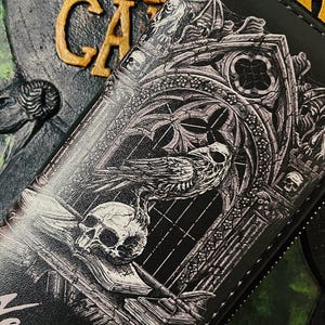 black raven wallet with zippered coin purse inside