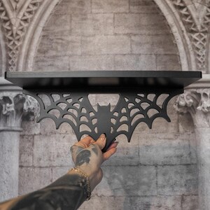 gothic black wood spiderweb shelf