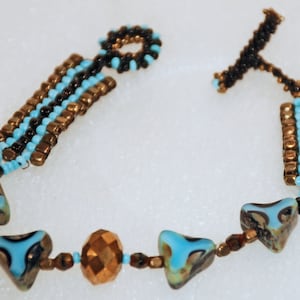 Sky Blue Woven Beaded Bracelet with Triangle Faceted Table Cut Triangle Beads and Faceted Bronze Bead / Hand Crafted one of a kind