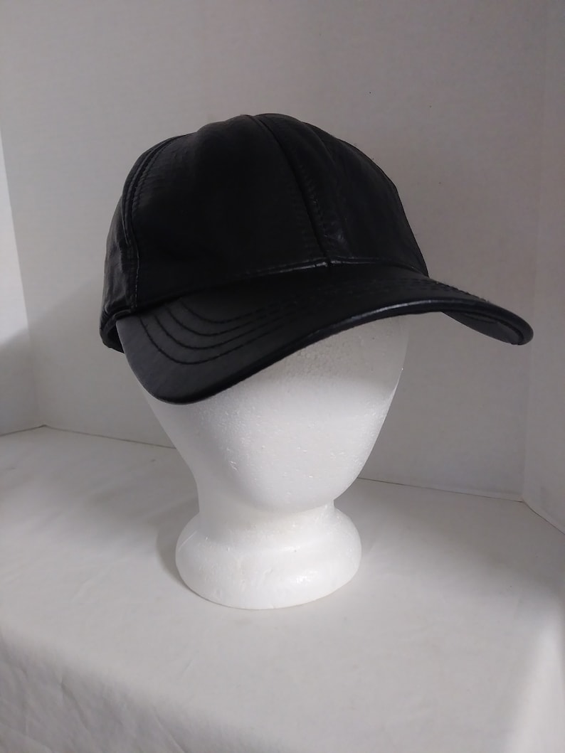 black faux leather cap