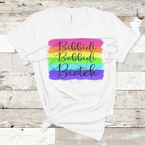 May include: White t-shirt with a rainbow-colored design and the text "Bibbidi Bobbidi Biotch" in black.