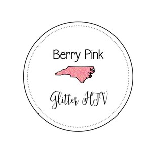 May include: A round sticker with a pink glitter outline of the state of North Carolina. The text "Berry Pink Glitter HTV" is written below the state outline.