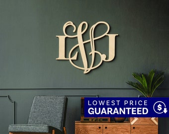 May include: A light-colored wooden wall decoration featuring a large, stylized monogram with the letters L and J intertwined with a central ampersand symbol. The letters are crafted in a decorative, cursive script font with smooth edges.