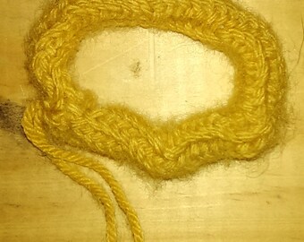 scrunchies made with a mustard yellow wool knitting