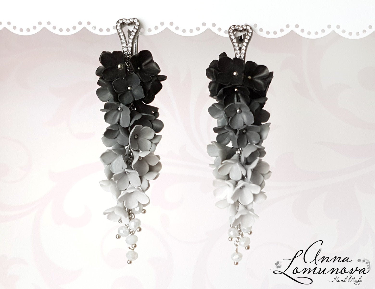 Black and white flower earrings discount