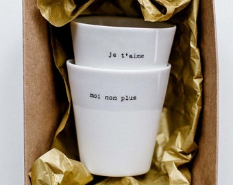 Duo of espresso cups “I love you” “me neither”