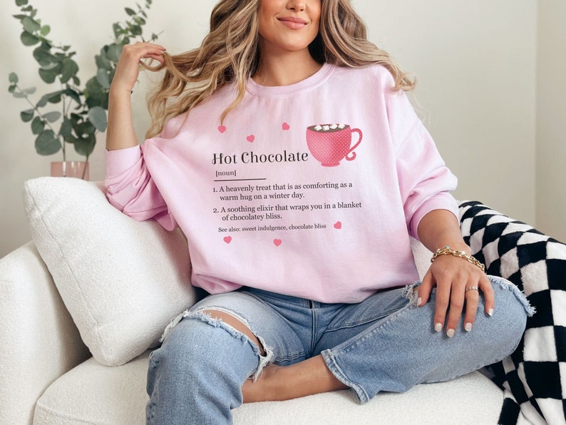 Cozy women's sweatshirt with a cute and whimsical hot chocolate dictionary style definition.