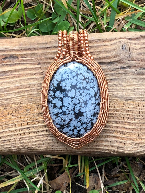Snowflake Obsidian wire wrap pendant wrapped in copper wire with faux leather cord necklace