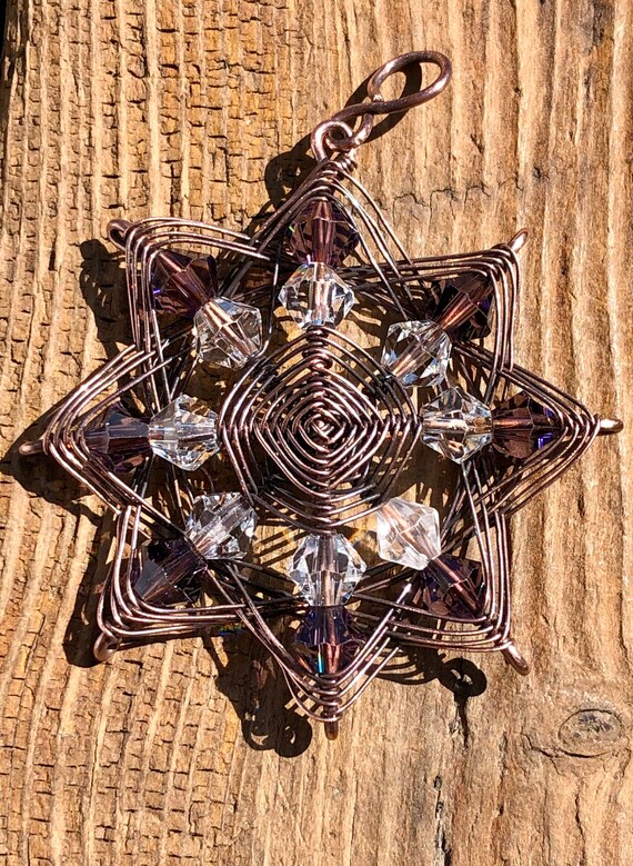 8 pointed star beaded wire wrap pendant wrapped in oxidized copper wire with faux leather cord necklace