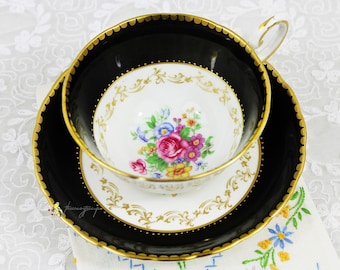Taza de té y platillo de porcelana inglesa con diseño floral multicolor, color negro brillante toscano, filigrana dorada, ideal para fiestas de té