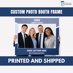 May include: A navy blue custom photo booth frame with white text that reads "CUSTOM PHOTO BOOTH FRAME", "LOGO COMPANY SLOGAN", "YOUR CAPTION HERE #CUSTOMHASHTAGS", and "PRINTED AND SHIPPED". Four people are inside the frame.