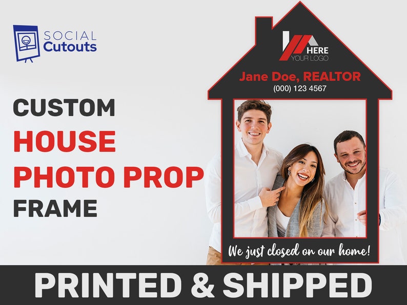 three people taking a photo in their house shaped real estate photo prop