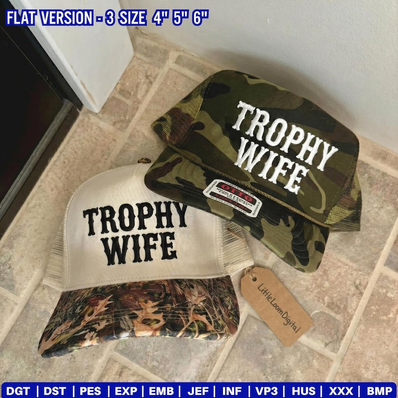 May include: Two trucker hats with the text "TROPHY WIFE" embroidered in white. One hat has a white front and a camouflage brim, the other is camouflage. A small tag reads "Little Loom Digital".