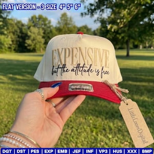 May include: A cream and red baseball cap with the text "EXPENSIVE but the attitude is free" embroidered on the front. The hat has a flat brim and a tag that says "Little Loom Digital".